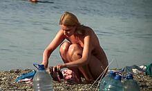 Busty blonde doing stuff on a nudist beach, looking hot