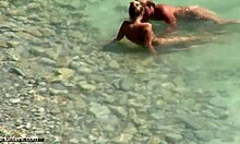 Passionate couple enjoying hardcore missionary sex on a beach